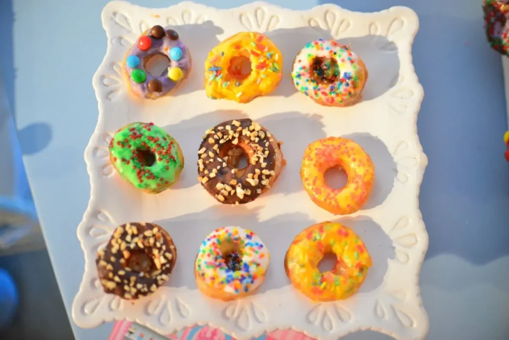 Assorted mini donuts with colorful toppings