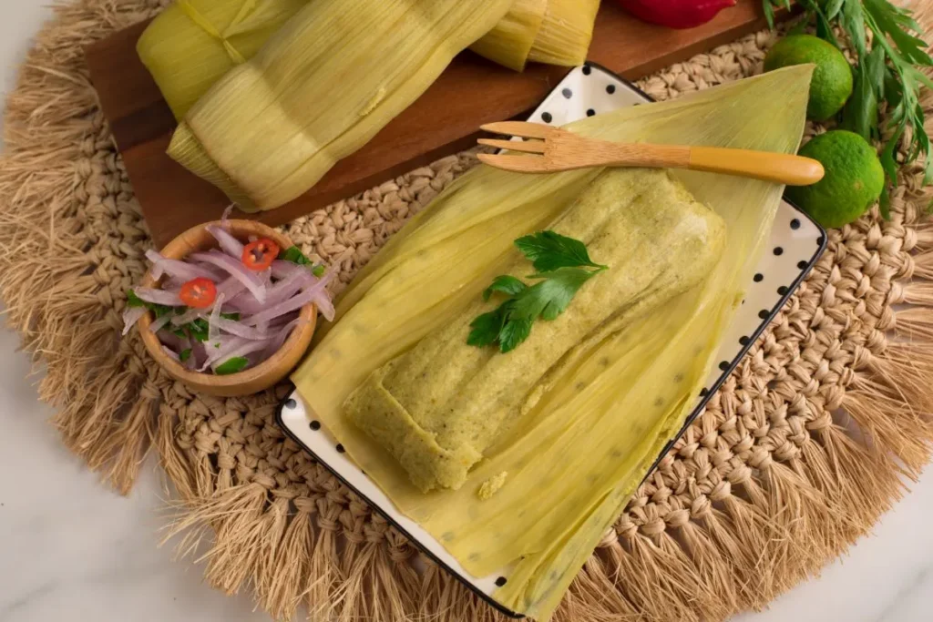 Beef Tamales Recipe - Freshly steamed beef tamales served with salsa verde