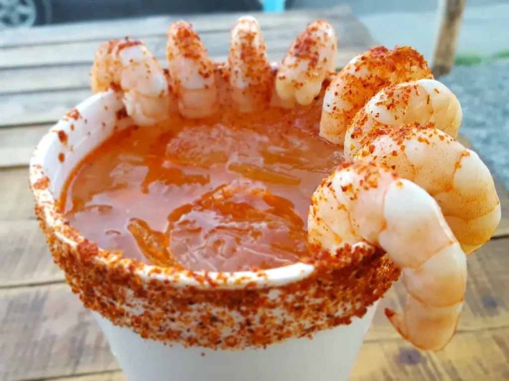 Best Sauce for Shrimp - Spicy shrimp cocktail served in a chili-rimmed cup