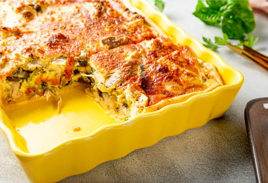 layered breakfast lasagna in a casserole dish