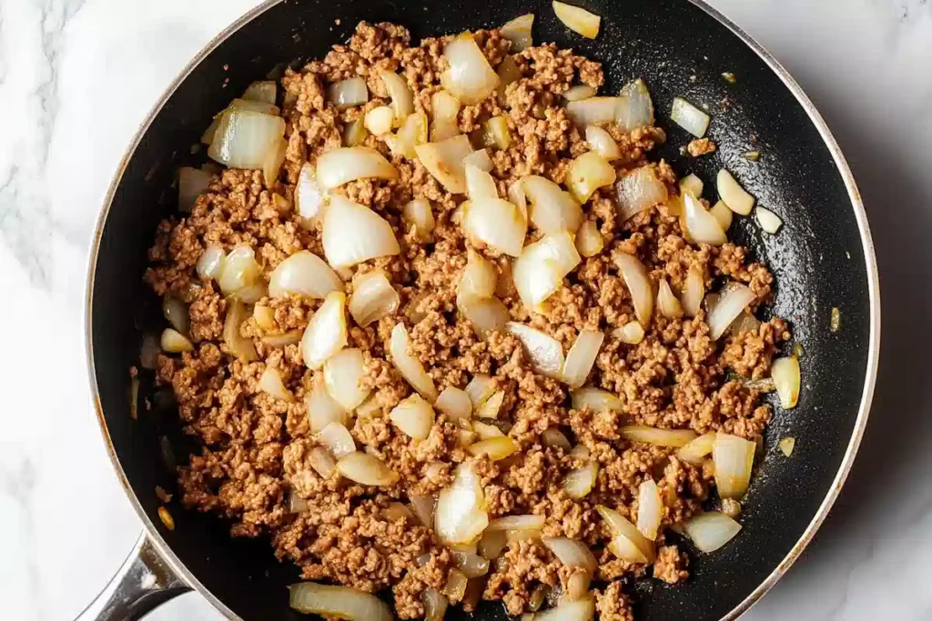 browning turkey mince in a skillet- turkey mince recipes